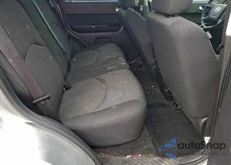 2009 Mazda Tribute S z USA, uszkodzony, nr VIN 4F2CZ06G59KM07689